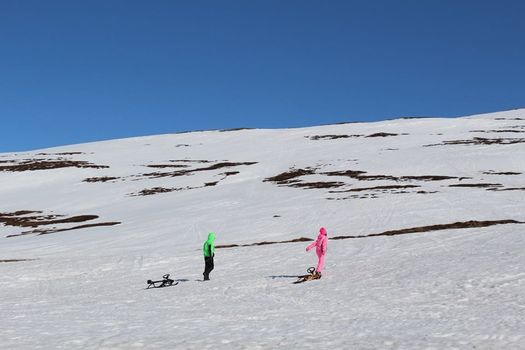 Snowmobile and slide Family tour