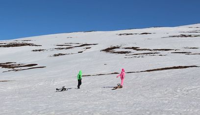 Snowmobile and slide Family tour