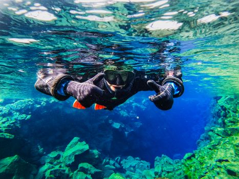 Black & Blue - Lava Tunnel + Silfra Snorkeling — photo 14